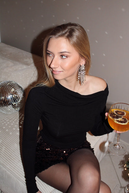 Top asymétrique MARTA